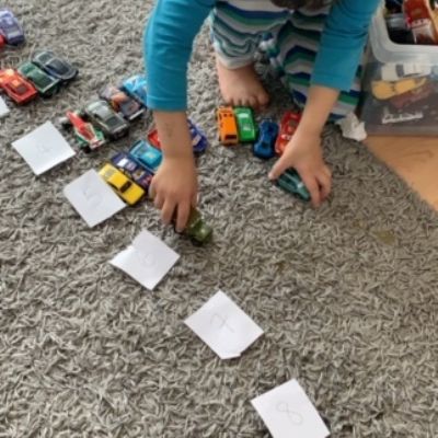 Adam is matching cars to numbers(1)